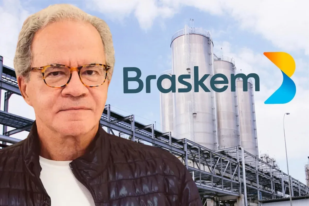 Empresário Nelson Tanure ao lado do logo da Braskem
