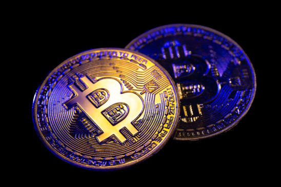 Bitcoin coin close-up on a black background. Finance concept. background with cryptocurrency. High quality photo Bitcoin coin close-up on a black background. Finance concept. background with cryptocurrency. High quality photo